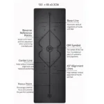 Black yoga mat measuring 183 x 68 x 0.5 cm, with integrated alignment lines and focus points for structured yoga practice.